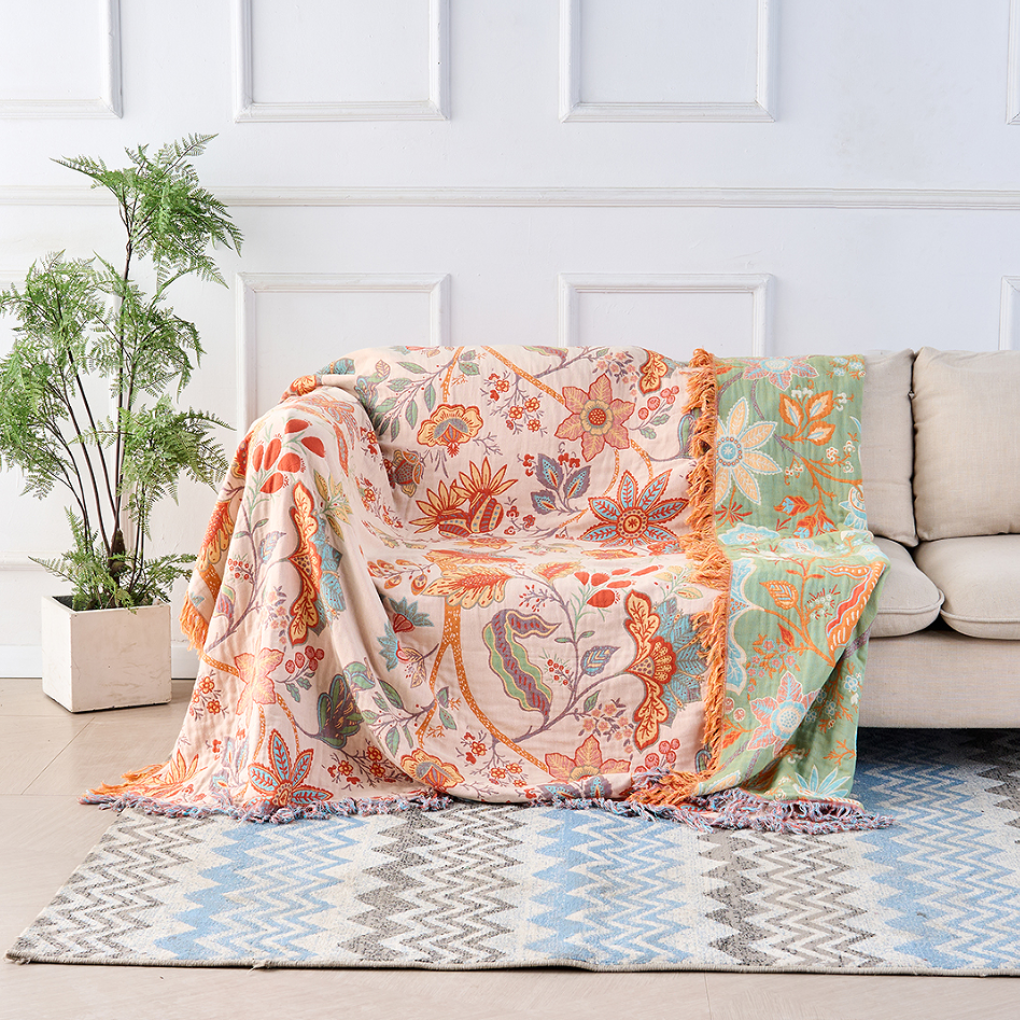 Coperta rustica con nappine floreali