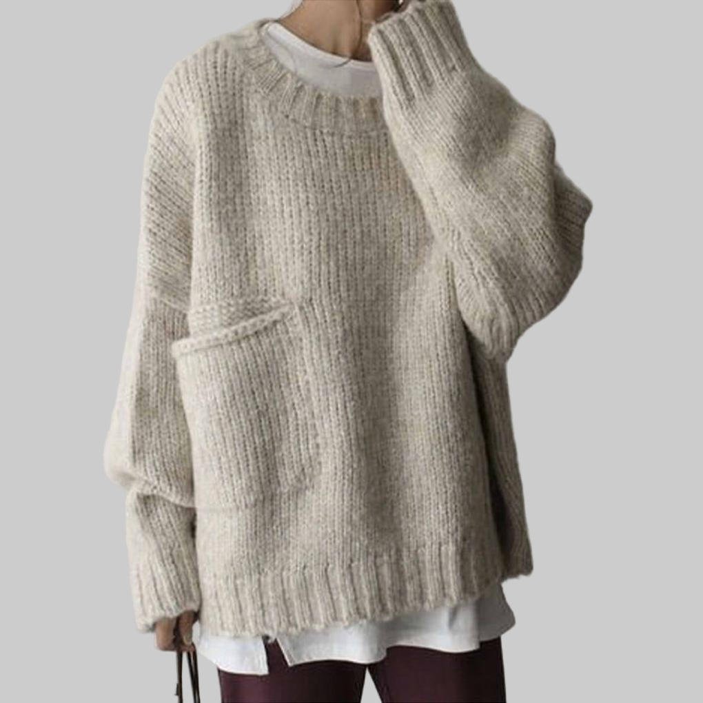 Suéter Oversize Marfil con Bolsillo Frontal – Capa Relajada para el Día a Día