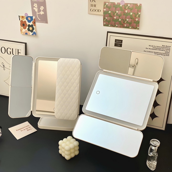 Espejo de tocador LED con triple iluminación ajustable y diseño compacto plegable