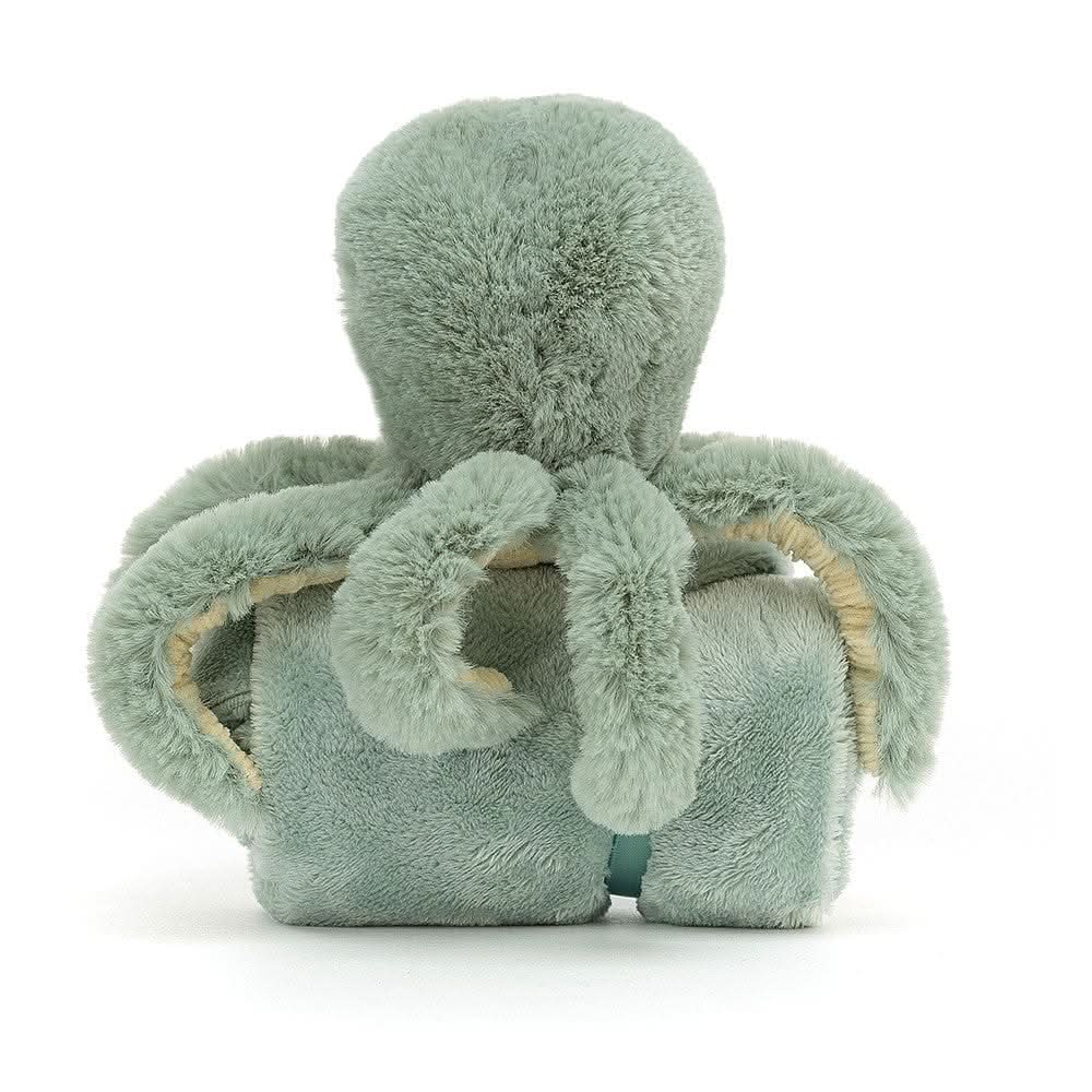 Pulpo calmante de peluche con manta