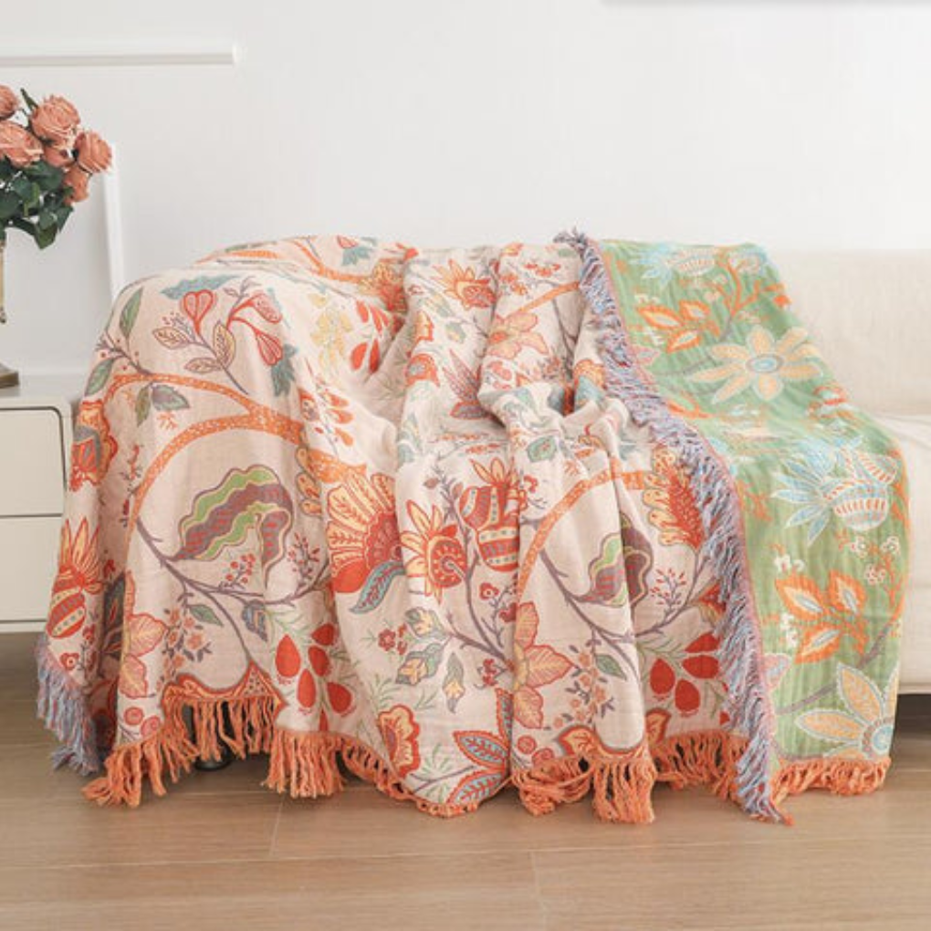 Coperta rustica con nappine floreali